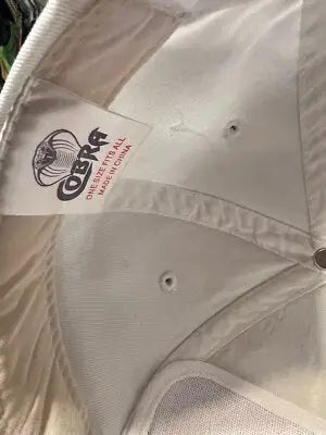 White Cobra SnapBack Hat with Cobra brand label for Keesler Federal Credit Union
