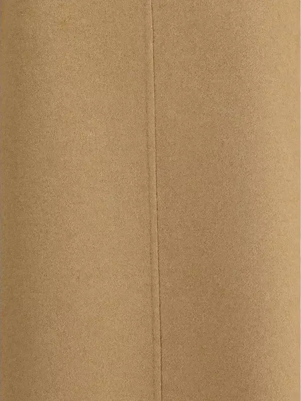 Plain light brown envelope with central seam, perfect for KHAITE Nyona Wool Dress packaging