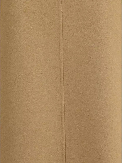 Plain light brown envelope with central seam, perfect for KHAITE Nyona Wool Dress packaging