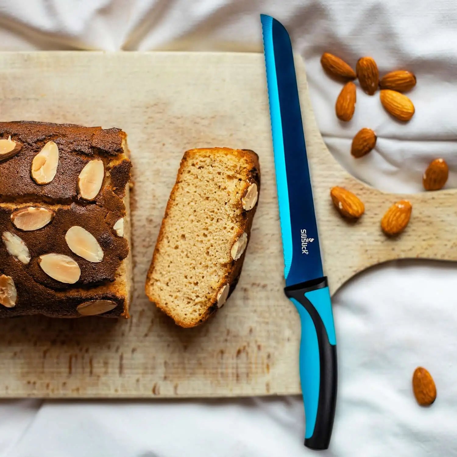 Blue and black serrated bread knife from Kitchen Knife Set Kit with light blue handle