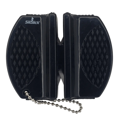Dark gray compact kitchen knife sharpener with textured grip pads and ball chain lanyard