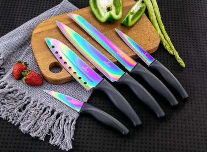 Iridescent rainbow-colored kitchen knife set with black handles, paring knife, and red magnetic rack