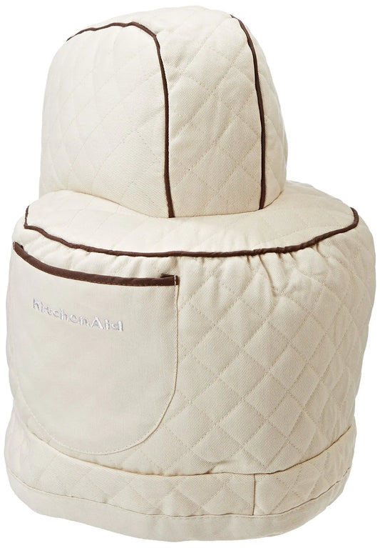 Quilted cream-colored appliance cover with brown trim for KitchenAid stand mixer in khaki