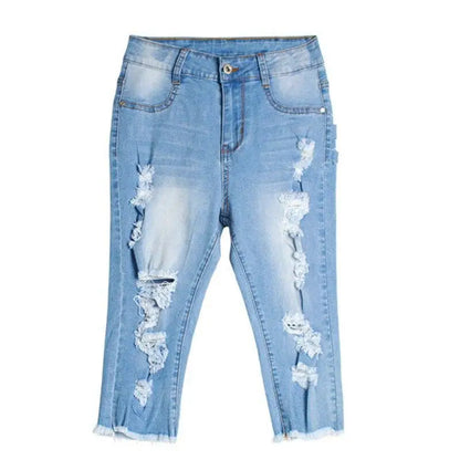 Light-wash distressed denim capri jeans with frayed hems, perfect destroyed ripped jeans