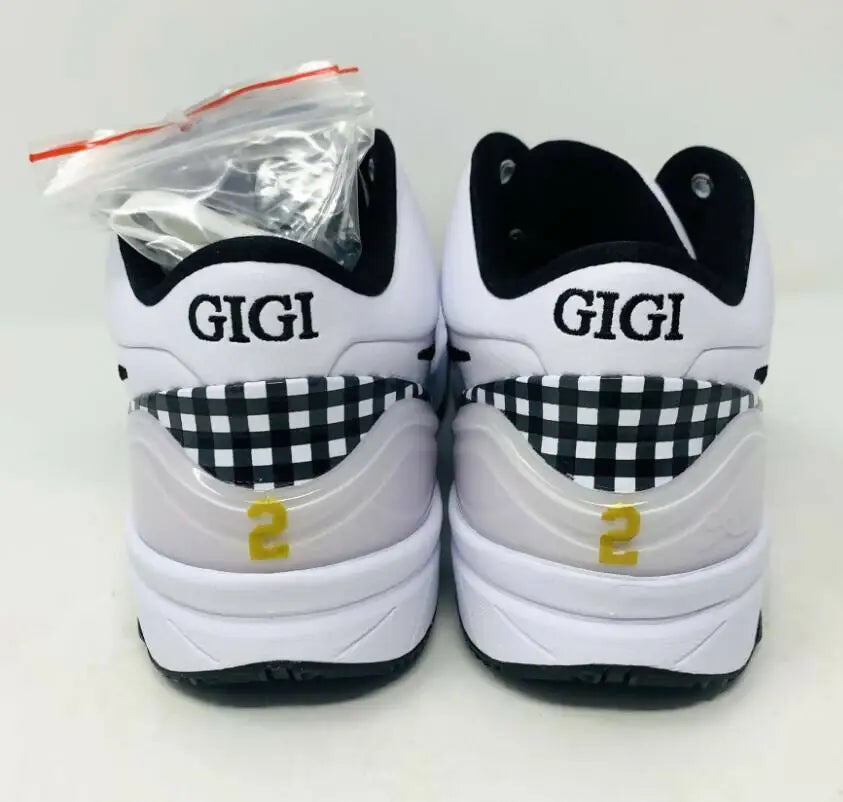 White Kobe 4 Gigi Mambacita sneakers with checkered accents and number 2, fast shipping