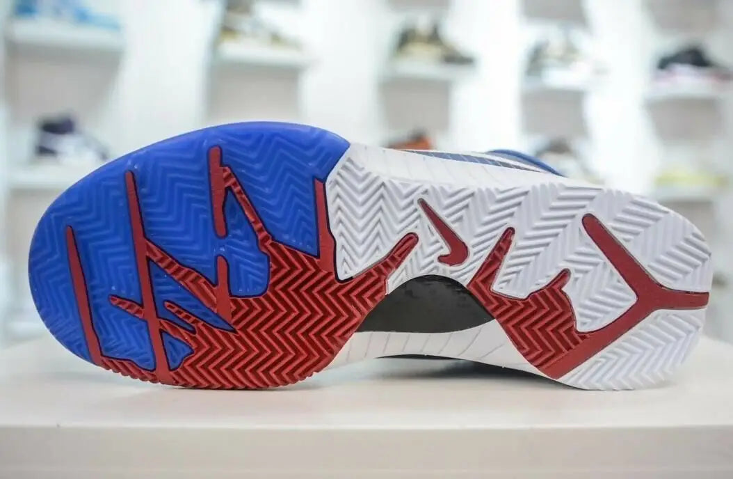 Sole of Kobe 4 Protro Philly athletic shoe with zigzag tread pattern, fast shipping