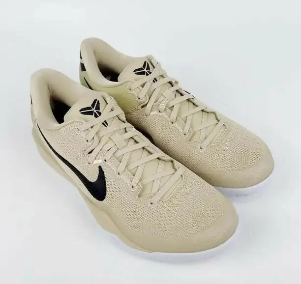 Light brown Nike Kobe basketball shoes with black accents, fast shipping available in business days