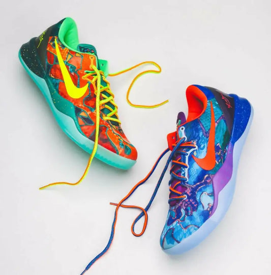 Vibrant mismatched Nike Kobe 8 Protro sneakers with colorful patterns and contrasting laces for fast shipping