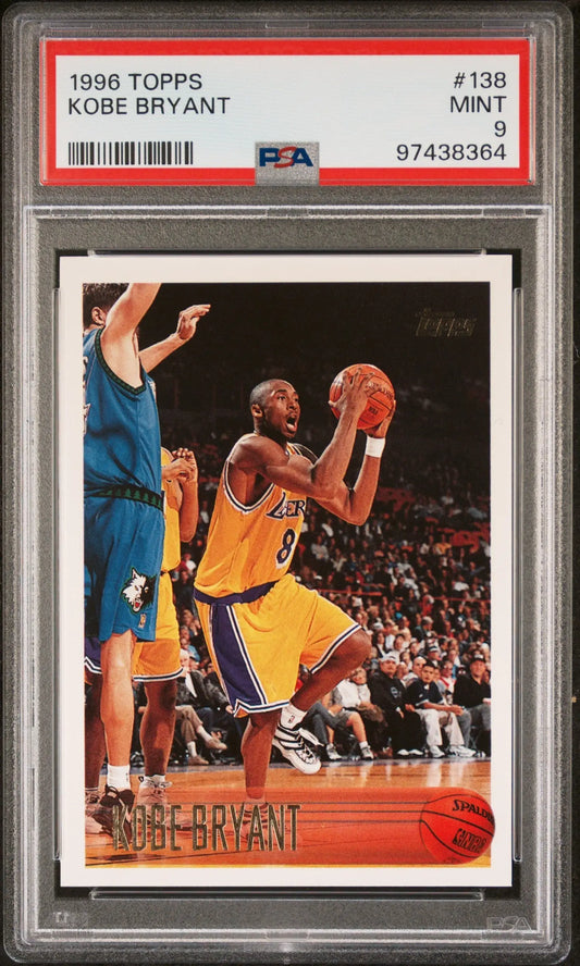 PSA-graded Kobe Bryant 1996 Topps Rookie #138 basketball card in yellow Lakers jersey