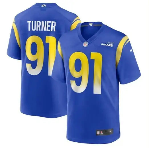 Blue and gold Los Angeles Rams jersey with number 91 for Kobie Turner Nike Home Game Jersey