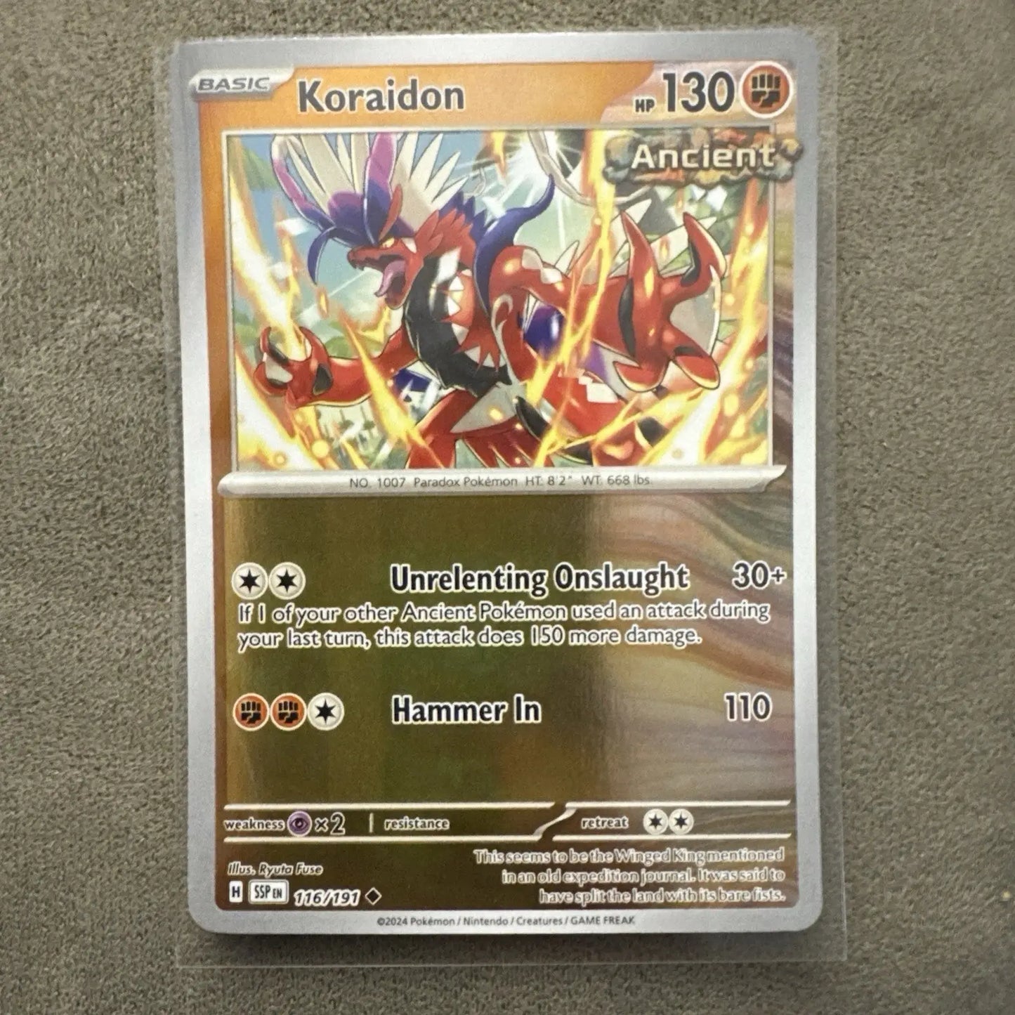 Shiny Koraidon Pokémon TCG card from Surging Sparks series, reverse holo NM
