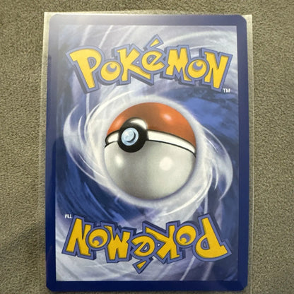 Pokémon TCG Koraidon card from Surging Sparks set, viewed from the back in NM condition
