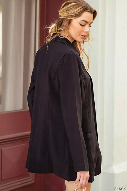 Black satin long sleeve blazer with high collar and button closure from Kori America