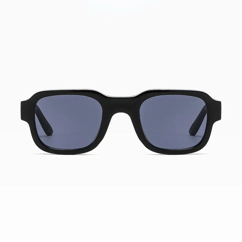 Kyomi Black Eye glasses made in Germany with black thick-framed sunglasses and dark lenses