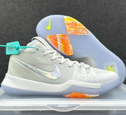 Light gray Kyrie 3 sneaker with holographic Nike swoosh and teal hang tag, fast shipping