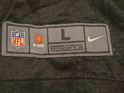 NFL jersey tag on Las Vegas Raiders Derrick Carr jersey showcasing las vegas raiders gear