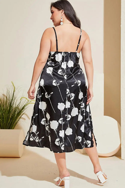 Plus size black satin slip dress with white floral print and lace trim side slit
