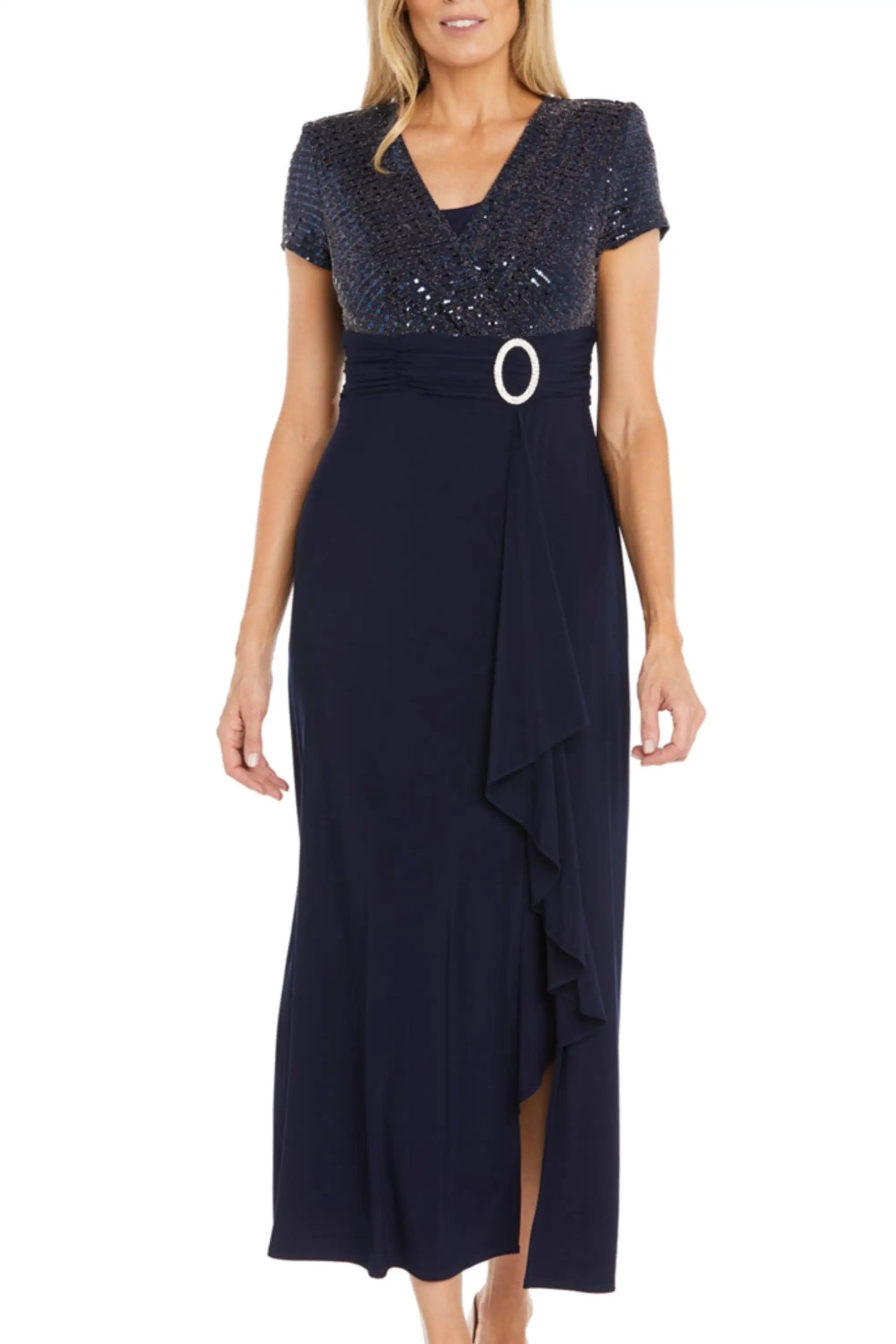 Navy blue formal maxi gown with sequined bodice, white O-ring belt, and ruffled slit