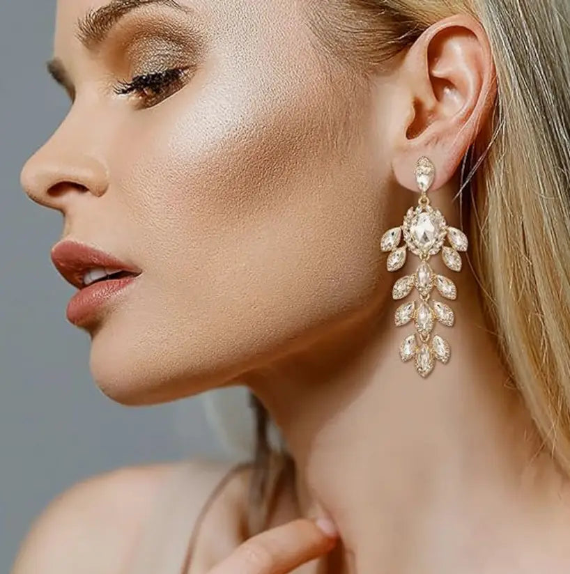 Glamorous gold and crystal chandelier drop earring with Art Deco design for ear piercing