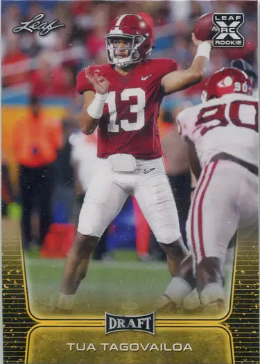 Football player in red jersey 13 throwing a pass on Leaf Draft Football trading card