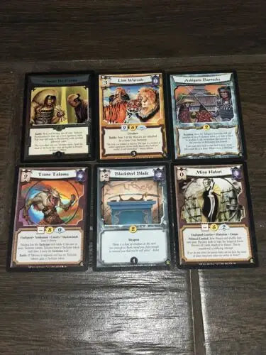Six Legend of the Five Rings cards from a trading card lot of 27 foil cards