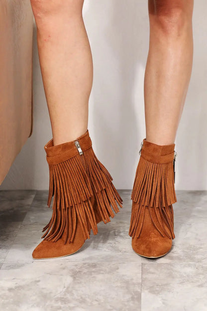 Tan suede ankle booties with fringe and zipper detail from Legend Womens Tassel collection