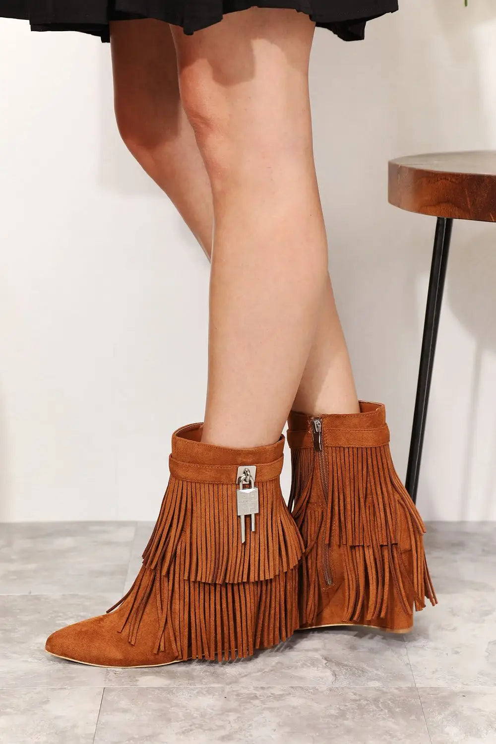 Tan suede ankle booties with fringe and silver hardware from Legend Womens Tassel collection
