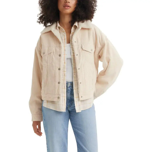 Woman’s beige corduroy trucker jacket from Levis Womens 90s Sherpa Trucker Jacket collection