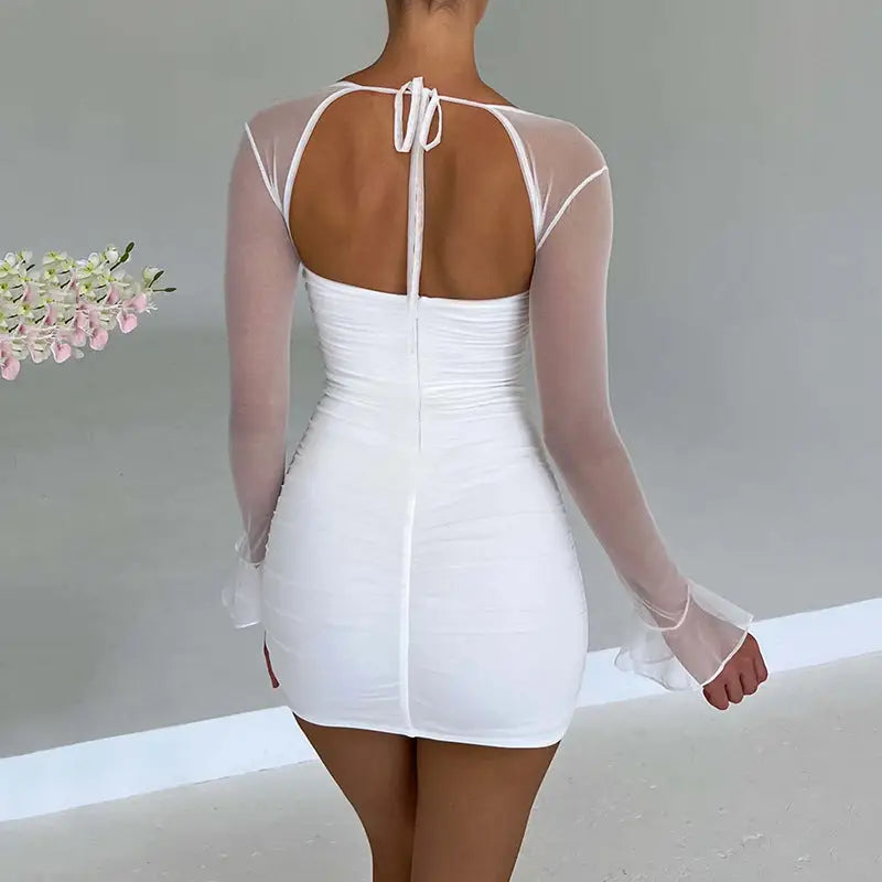 White long sleeve ruched bodycon dress with open back and tie closure for business days