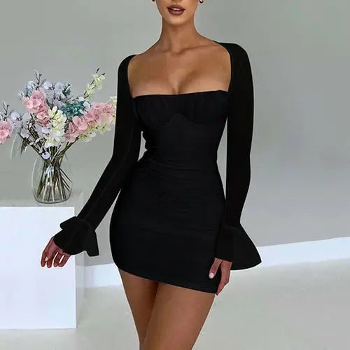 Woman in black long sleeve high-waisted bodycon dress with square neckline and flared cuffs