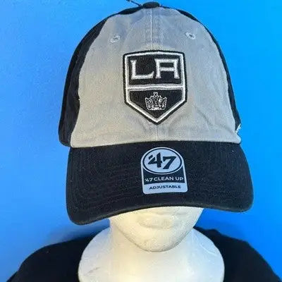 Gray and black LA Kings adjustable baseball cap with silver logo display