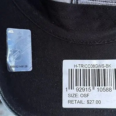 Black Los Angeles Kings 47 Clean Up Hat with NHL hologram and price tag