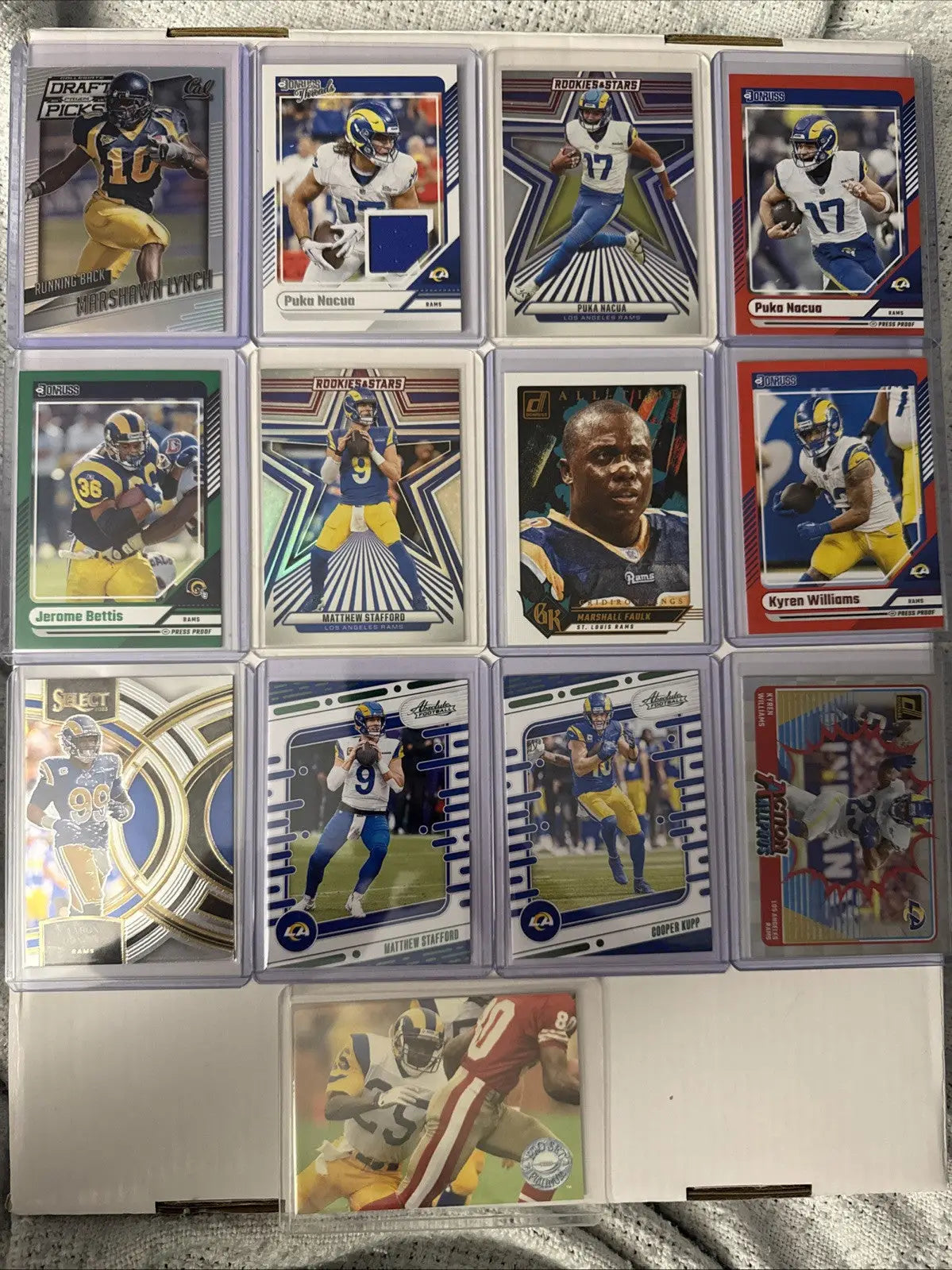 Los Angeles Rams card lot featuring Puka Nacua, Matt Stafford, and Kyren Williams