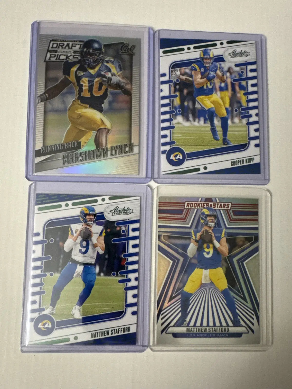 Los Angeles Rams football card lot featuring Puka Nacua and two Matt Stafford cards