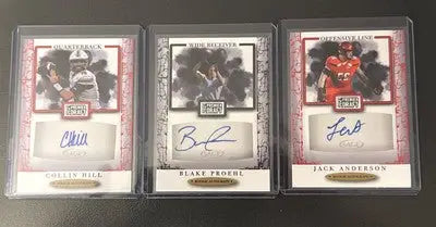 Autographed football cards in protective cases from Sage Premier Draft Rookie collection