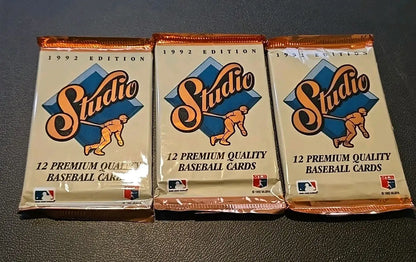 Three 1992 Studio baseball card packs in a Lot Of 9 1990s Baseball Card Packs