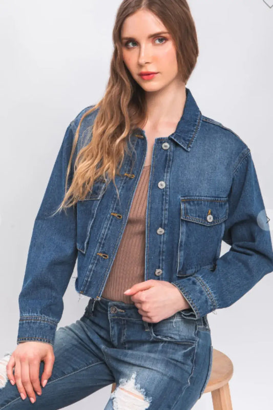 Denim jacket with raw hem distressed details and button closure in dark blue