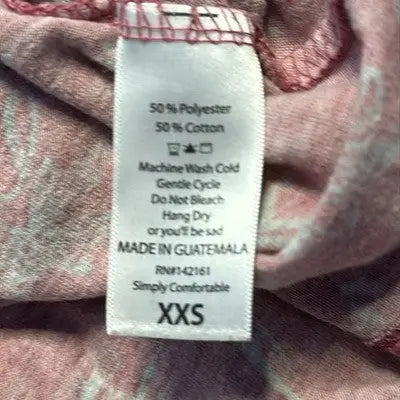 Clothing care tag with fabric blend and washing instructions on Lularoe Red Gray Crew Neck Dress