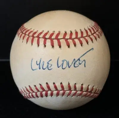 Autographed baseball featuring Lyle Lovett signature and Beckett certification