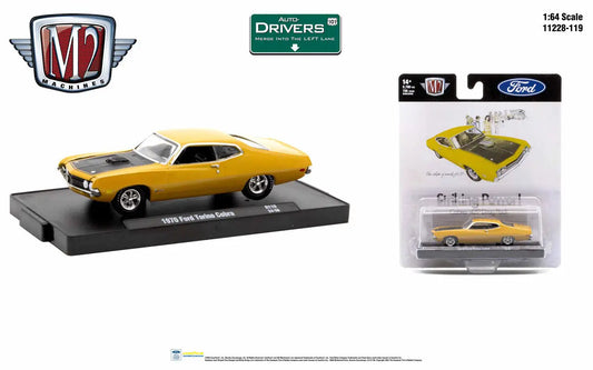 Yellow 1970 Ford Torino Cobra die-cast model car displayed in package and out
