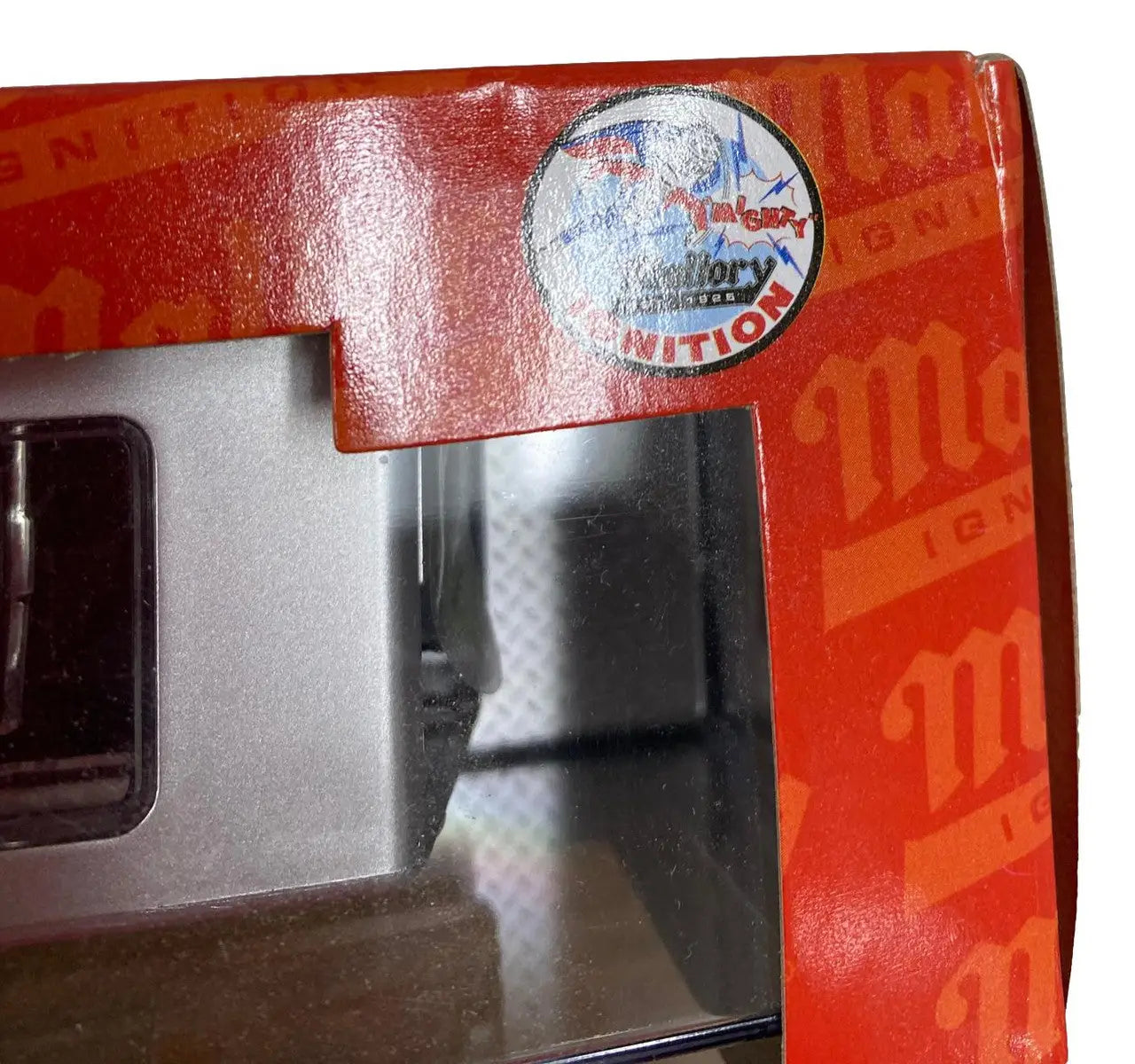 Corner of a red retail box for M2 Machines Auto Hauler Chevrolet C60 Truck product