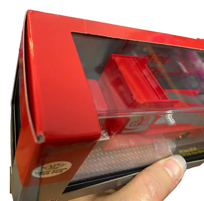 Red Etch A Sketch drawing toy with knobs, featured in M2 Machines Auto Hauler TW12 Diet Coke Chase