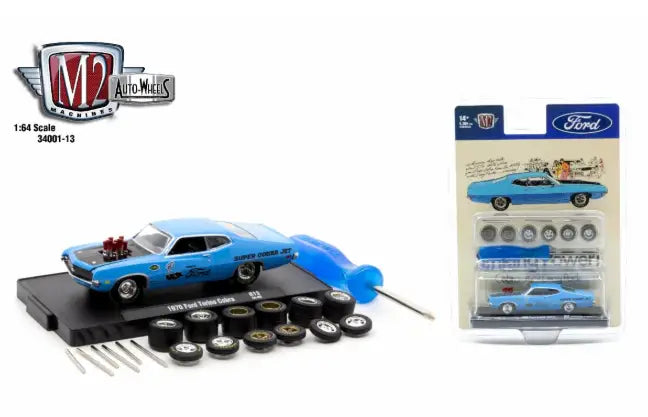 Light blue 1970 Ford Torino Cobra diecast model car with interchangeable wheels and screwdriver