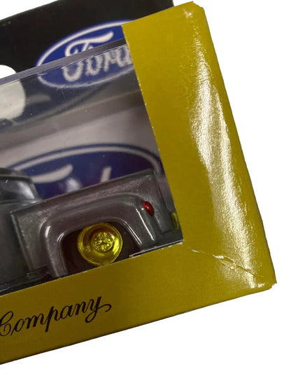 Packaged toy car with yellow wheels in Ford box for M2 Machines Ground Pounder R26 Truck Raw Chase