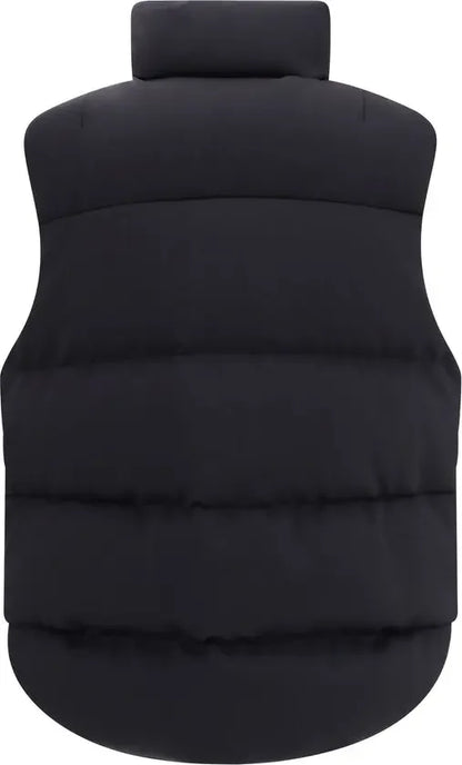 Black puffer vest on a white background
