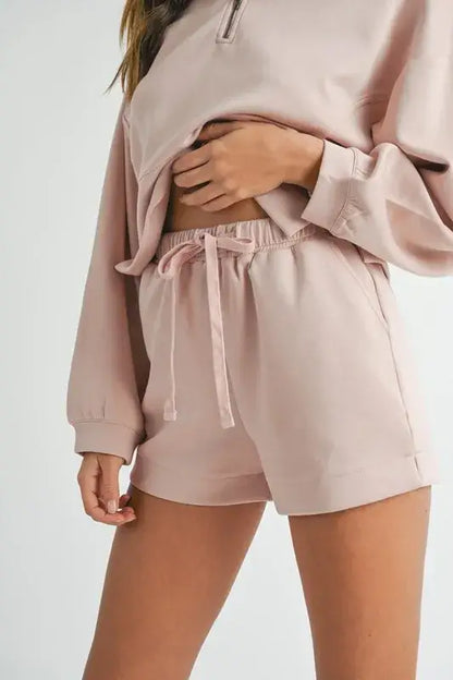 Light pink women’s half zip sweatshirt and shorts set from Mable Apparel, last few smalls