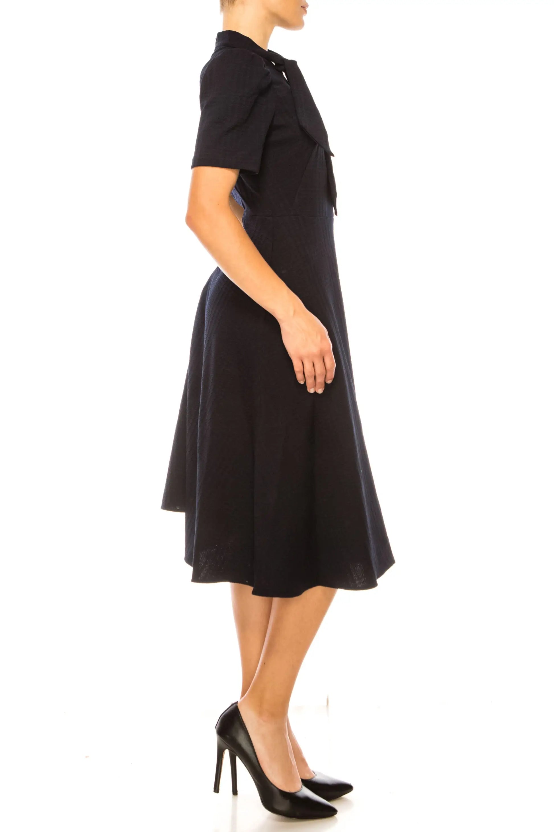 Black Maggy London midi dress with collared neckline and pointed-toe stilettos