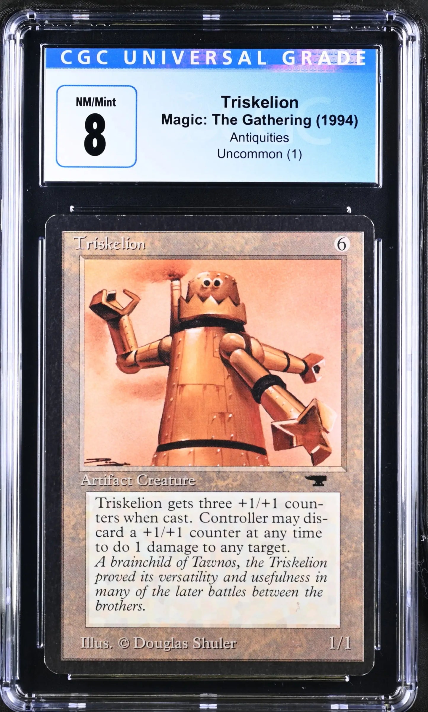 Graded Magic: The Gathering Triskelion trading card featuring a robotic figure illustration