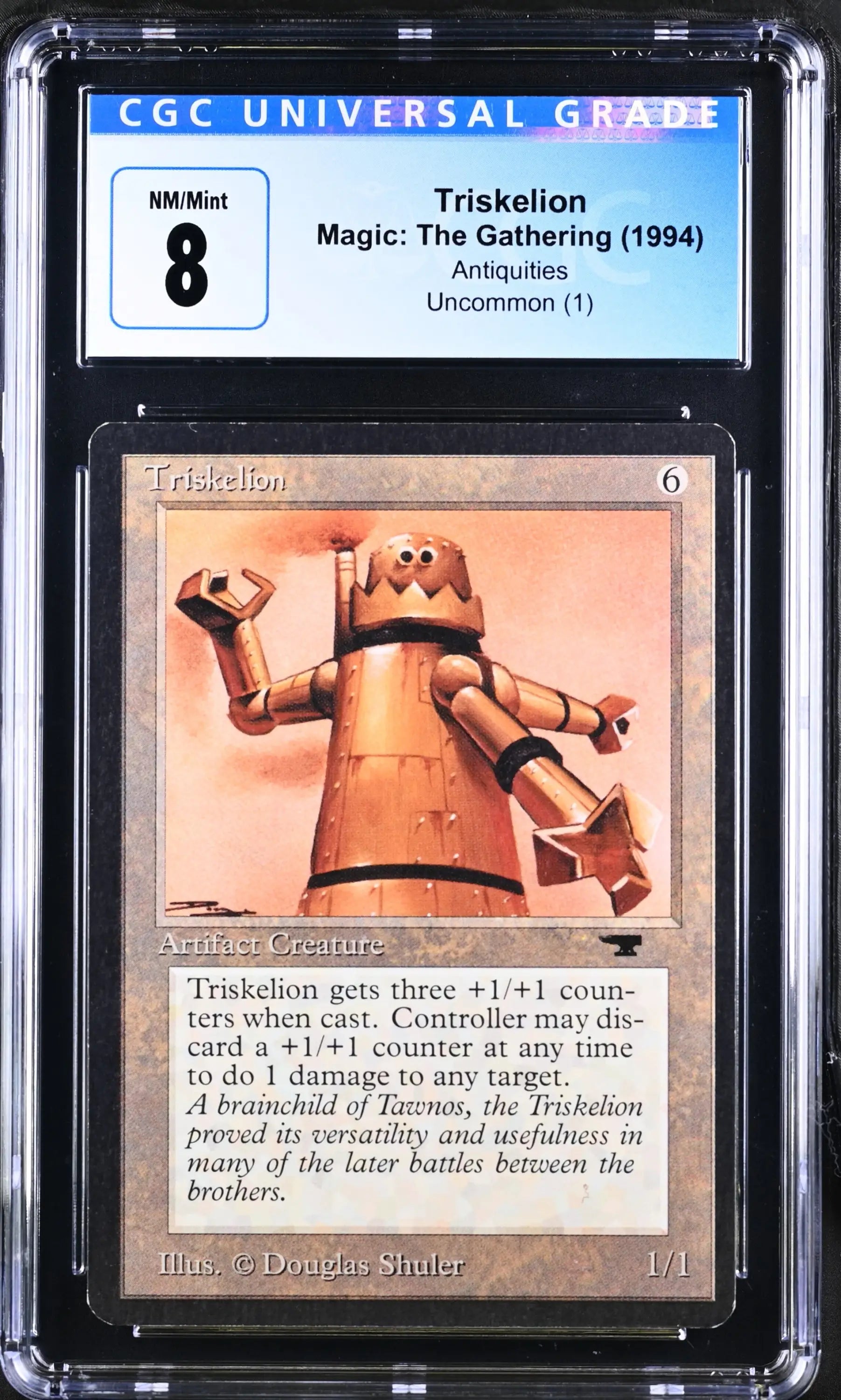 Graded Magic: The Gathering Triskelion trading card featuring a robotic figure illustration