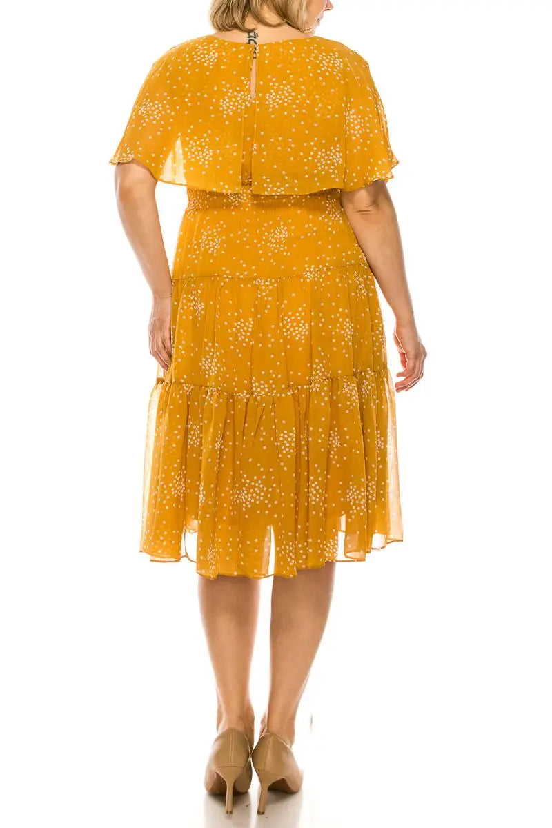 Maison Tara Golden Spice tiered chiffon midi dress with white polka dots, summer fashion